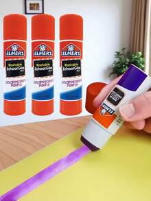 Elmer's Pegamento En Barra Elmers Color Morado, Lápiz Adhesivo escolar en barra de color morado que sirve para ver donde estas pasando la barra facilita el uso,  con secado en color transparente, Lapiz Adhesivo Elmers School Glue De 6 Gr - Morado Violeta - Ver 1