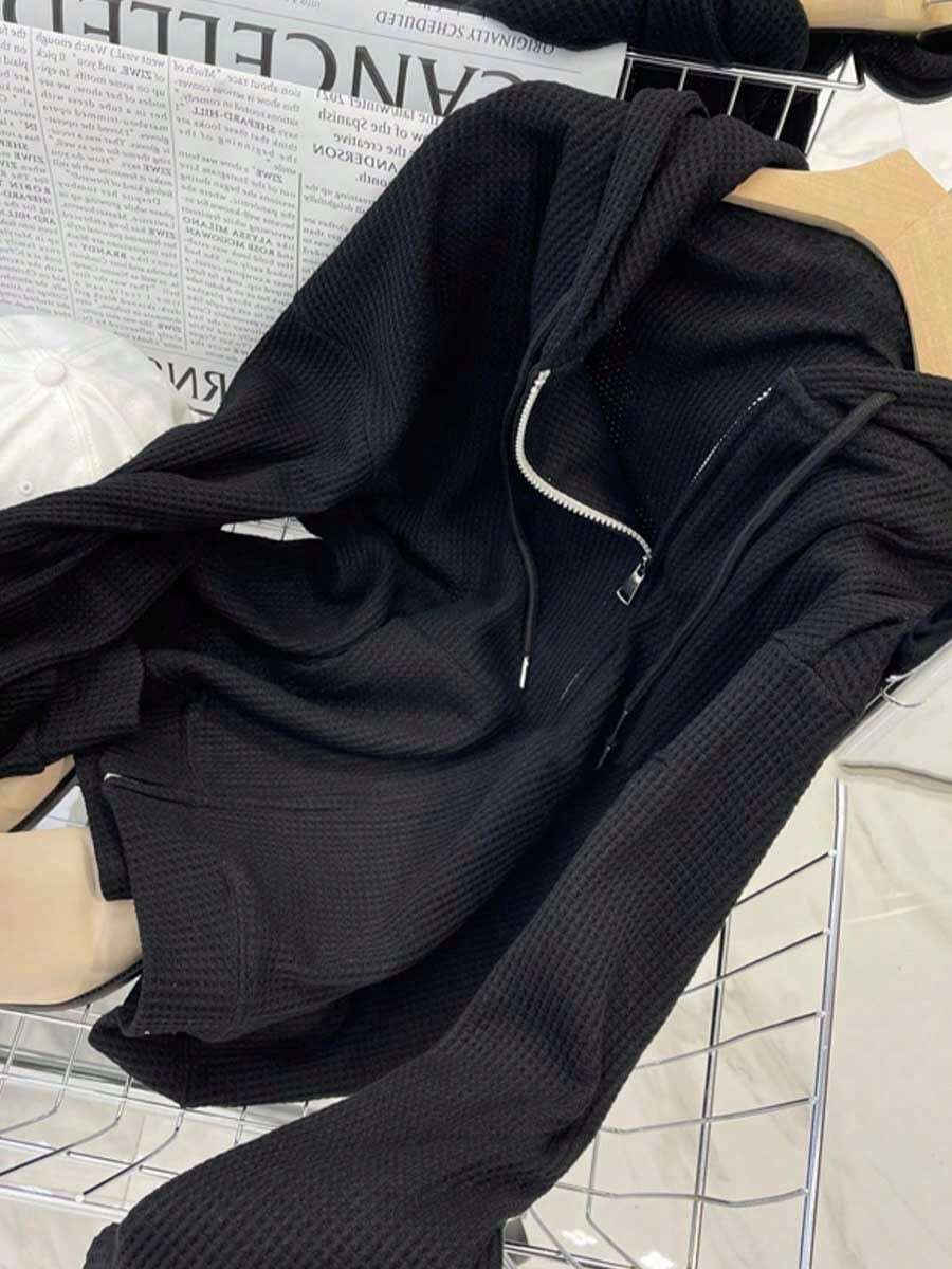 Sudadera con capucha y tejido de gofre para mujer con cordón en la cintura. Oversize pero favorecedora, diseño exclusivo y estético. Chaqueta de primavera/verano para mujer. Cárdigan con cremallera. - Negro - Ver 1