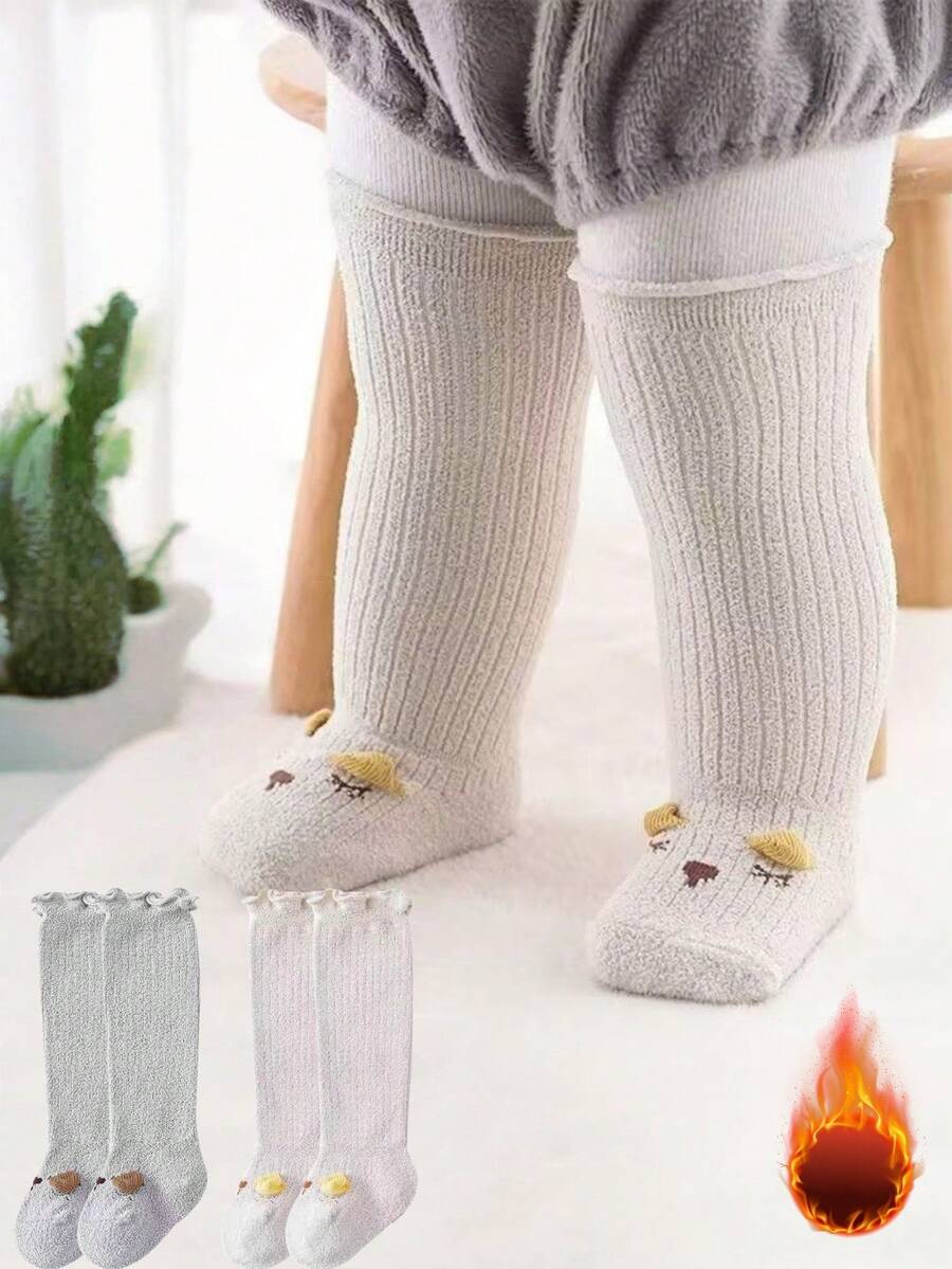 2 Pairs Of Fleece And Thickened Baby Socks. The Fabric Is Fine And Not Irritating To The Skin. The Classic Jacquard Weaving Not Only Makes The Socks More Textured But Also Firmly Locks In Warmth, Keeping The Baby's Little Feet Warm Even In Cold Waves. It Goes Well With All Kinds Of Outfits For Babies, Adding More Cute Details To The Winter Looks Of The Adorable Kids. It Is Suitable For Both Learning To Walk At Home And Taking A Stroll Outside - Multicolor - View 1