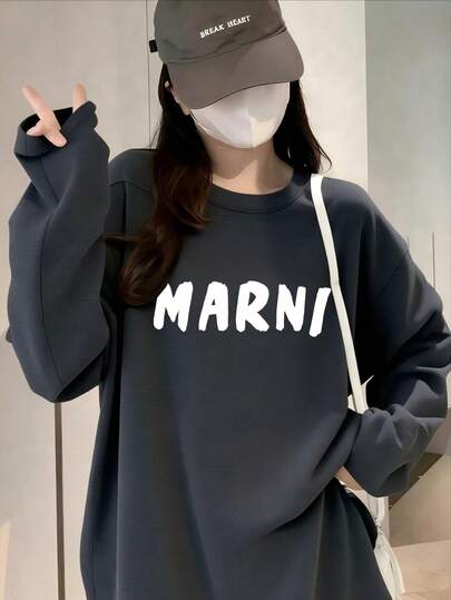 Domestic Shipping Available. Women's White Long-Sleeved T-Shirt With Print. Korean-Style Top. New For Fall. Y2K Top. Korean Style. Loose Fit. Casual. Long-Sleeved T-Shirt.