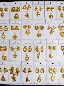 Bộ trang sức 24 món bằng thép không gỉ với họa tiết trái tim hình học và hoa lá, lấy cảm hứng từ phong cách Trung Đông Dubai, mang đến vẻ hiện đại rạng rỡ. Thích hợp làm quà cưới, trang trí tiệc, quà năm mới hoặc phụ kiện đa năng cho mọi mùa (mẫu ngẫu nhiên). - Nhiều màu - Xem 3