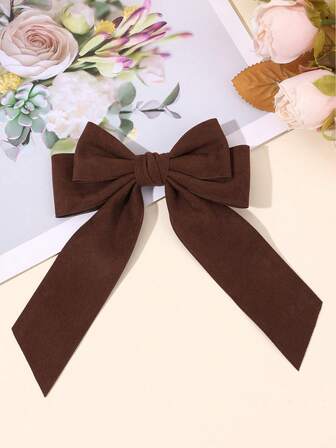 1个咖啡棕色绒面革蝴蝶结发夹，优雅简约，鳄鱼夹长尾设计，柔软舒适，适合秋冬季节佩戴，纯色发夹，日常简约发饰，女士发饰，发夹，发卡