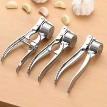 Premium Aluminum Alloy Multi-Functional Kitchen Tool - 3-In-1 Heavy Duty Garlic Press Nut Cracker And Bottle Opener Combo - Professional Grade Cooking Utensil For Efficient Food Preparation - Ergonomic Design With Non-Slip Handle For Comfortable Use - High Leverage Mechanism Ensures Easy Crushing And Cracking - Durable Coating For Long-Lasting Performance - Easy To Clean Dishwasher Compatible Construction - Ideal For Home Kitchen And Commercial Use - Suitable For Garlic Ginger Nuts And Seeds - Versatile Tool Saves Storage Space - Made From Quality Aluminum Alloy Material - Perfect For Daily Cooking Needs - Great Gift For Cooking Enthusiasts - 銀色 - 查看 5