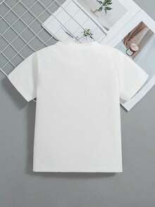 Esta nueva camiseta de manga corta para niñas, 100% algodón, luce un estampado navideño y un corte holgado, informal y versátil. Confeccionada con un tejido suave y delicado con la piel, es suave con la piel sensible de tu hija, permitiéndole moverse con libertad y comodidad durante las reuniones familiares navideñas, los eventos escolares o los juegos al aire libre. - Blanco - Ver 2