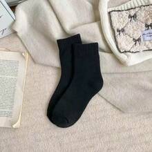 5 paires de chaussettes d'hiver pour femmes, chaussettes de bottes pour femmes en coloris unicolore, épaisses et chaudes, chaussettes d'équipage confortables