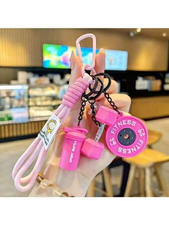 Hantel- och skivstångsnyckelringsset, perfekt för att hänga nycklar på ryggsäckar. Kreativa träningstillbehör inkluderar hantel, skivstångsplattor, boxningshandskar och andra dekorativa hängen. Kan göras själv med nyckelringar och väskberlocker. En perfekt present till högtider, fester och födelsedagar.