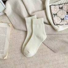 5 paires de chaussettes d'hiver pour femmes, chaussettes de bottes pour femmes en coloris unicolore, épaisses et chaudes, chaussettes d'équipage confortables