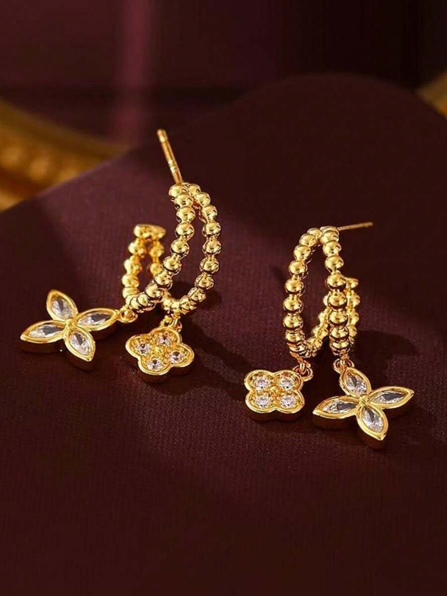 一套优雅的925纯银白色四叶草吊坠耳环，适合作为情人节周年纪念礼物。 - 金色-四葉草吊墜耳釘 - 查看 1