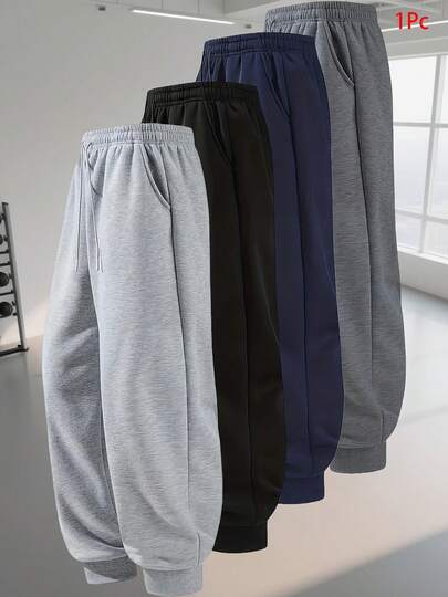 Este conjunto de pantalones deportivos de una pieza está hecho de tela cómoda y es un pantalón casual de unicolor y versátil para hombres adecuado para todas las estaciones. Presenta un diseño de pantalón deportivo holgado con cintura elástica y cordón, lo que evita eficazmente que entre el viento frío. Los bolsillos laterales están hechos de tela suave, adecuados para el fitness diario y el uso casual.