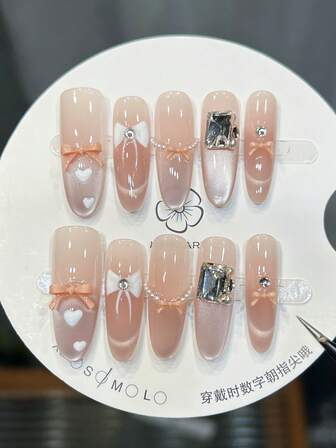 10片手工椭圆形美甲贴片，长款优雅粉色渐变美甲，闪亮猫眼法式美甲，手绘蝴蝶结爱心，镶嵌大颗钻石美甲宝石，简约优雅秋季美甲，秋季美甲贴片，婚礼美甲，多功能美甲DIY假指甲，适合派对、日常、约会、海滩、热带度假等场合，可重复使用，送给女性和女孩的礼物，美甲用品