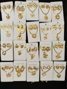 Bộ trang sức 24 món bằng thép không gỉ với họa tiết trái tim hình học và hoa lá, lấy cảm hứng từ phong cách Trung Đông Dubai, mang đến vẻ hiện đại rạng rỡ. Thích hợp làm quà cưới, trang trí tiệc, quà năm mới hoặc phụ kiện đa năng cho mọi mùa (mẫu ngẫu nhiên). - Nhiều màu - Xem 2