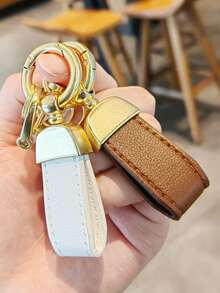 1 pieza Llavero de muñeca de estilo francés de cuero con 2 anillos para llaves y anillo en D anti-pérdida, correa portallaves unisex corta, llavero de coche de moda multicolor, accesorio de bolso de estilo empresarial para uso diario de hombres, accesorio de coche casual, estilo gótico lindo Y2K para la escuela