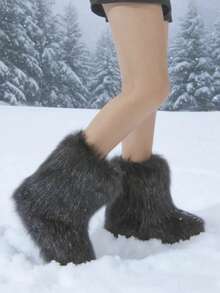 New Winter Style Black Faux Fur Ankle Boots. Made With Specially Selected Extra-Long Plush For A Fluffy And Stylish Look. The Matte Finish And Silky Touch Are Perfectly Blended. The Ankle-Length Design Precisely Flatters The Ankle Line, While The Rounded Toe Relieves Pressure On The Feet. The Densely Packed Plush Lining Provides Warmth, And The Slightly Wider Boot Shaft Accentuates The Slender Ankle Curve. Classic Black With Gold Accents. Suitable For Everyday Wear, Parties, And Dates. The Fluffy Plush Is Lightweight And Not Bulky, Creating A Y2K Millennial Chic Look. Dynamic Beauty With Every Step.
