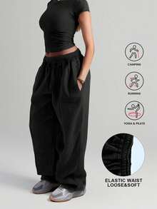 Plus Size Women Solid Color Casual Loose Pocket Sweatpants - Black - View 1