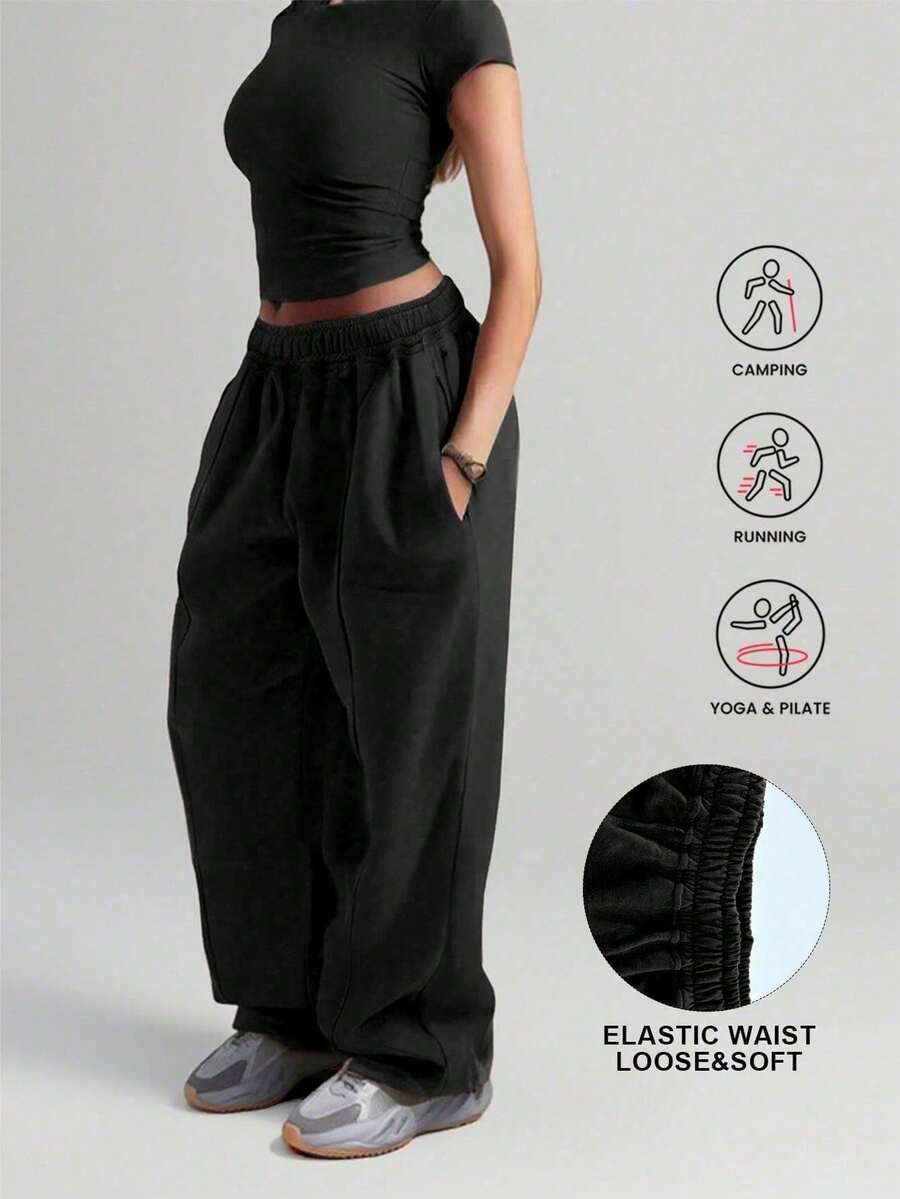 Plus Size Women Solid Color Casual Loose Pocket Sweatpants - Black - View 1