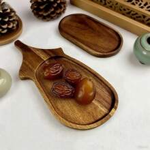 红木托盘，又称盘子、托盘、碟子、木质托盘，经久耐用，不易开裂，可用于盛放餐食、茶具、水果、蔬菜、装饰品、厨房用品，适合日常家居使用、生日装饰、斋月餐具、母亲节礼物等。 - 金色 - 查看 3