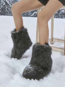 New Winter Style Black Faux Fur Ankle Boots. Made With Specially Selected Extra-Long Plush For A Fluffy And Stylish Look. The Matte Finish And Silky Touch Are Perfectly Blended. The Ankle-Length Design Precisely Flatters The Ankle Line, While The Rounded Toe Relieves Pressure On The Feet. The Densely Packed Plush Lining Provides Warmth, And The Slightly Wider Boot Shaft Accentuates The Slender Ankle Curve. Classic Black With Gold Accents. Suitable For Everyday Wear, Parties, And Dates. The Fluffy Plush Is Lightweight And Not Bulky, Creating A Y2K Millennial Chic Look. Dynamic Beauty With Every Step.