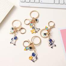 1pc Creative Astronaut & Planet Keychain, Perfect Gift For Friends, Elegant Bag Charm