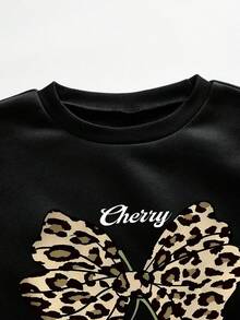 Young Girl Cherry Print Crew Neck Sweatshirt And Black Flare Pants Set