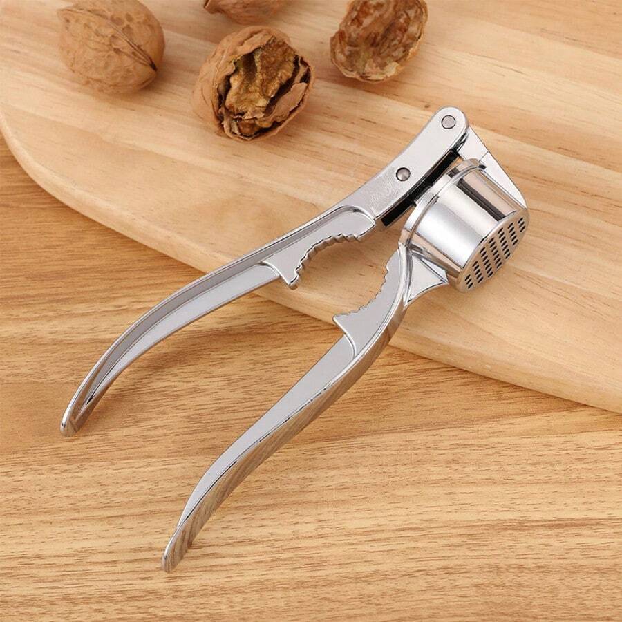 Premium Aluminum Alloy Multi-Functional Kitchen Tool - 3-In-1 Heavy Duty Garlic Press Nut Cracker And Bottle Opener Combo - Professional Grade Cooking Utensil For Efficient Food Preparation - Ergonomic Design With Non-Slip Handle For Comfortable Use - High Leverage Mechanism Ensures Easy Crushing And Cracking - Durable Coating For Long-Lasting Performance - Easy To Clean Dishwasher Compatible Construction - Ideal For Home Kitchen And Commercial Use - Suitable For Garlic Ginger Nuts And Seeds - Versatile Tool Saves Storage Space - Made From Quality Aluminum Alloy Material - Perfect For Daily Cooking Needs - Great Gift For Cooking Enthusiasts - 銀色 - 查看 1