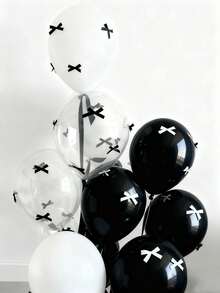 57/112件套黑白蝴蝶结气球套装，包含透明泡泡气球、黑白丝带和胶水，是生日、周年纪念日、婚礼、情人节、母亲节、圣诞节等派对的必备装饰品，也是居家圣诞礼物和圣诞装饰的理想之选。