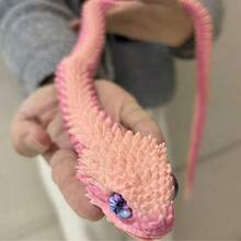 1. 3D打印蛇眼雕像 - 适用于家居、办公室、汽车、派对装饰和节日礼物。采用PLA材料制成，眼睛颜色随机。