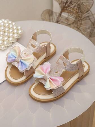 热销！新款奢华女童金色亮片凉鞋，饰有3D彩虹蝴蝶结，公主鞋，儿童软底防滑凉鞋，夏季沙滩度假及节日庆典鞋