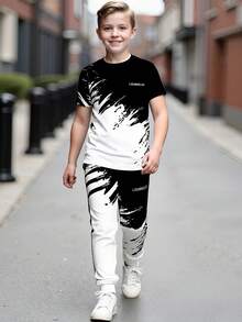 2pcs/Set Teen Boy Spring/Summer Short Sleeve T-Shirt And Jogger Pants, Black & White Contrast Artistic Design, Streetwear Casual Outfit - Black - View 2