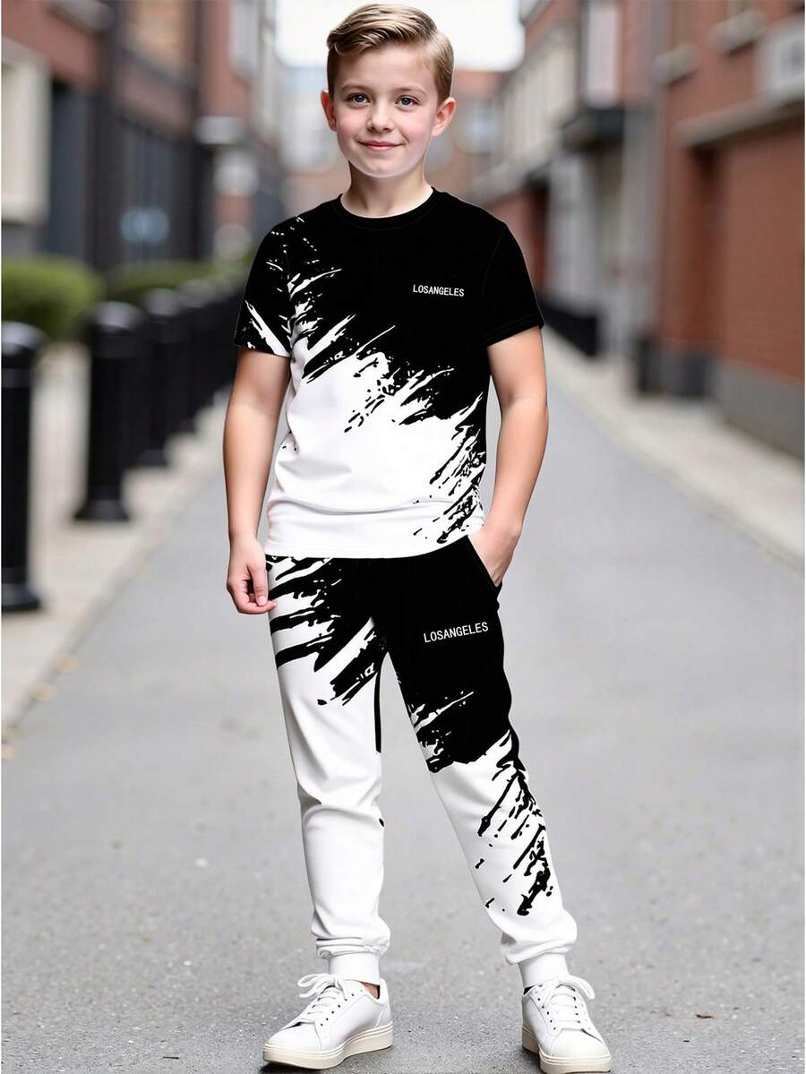 2pcs/Set Teen Boy Spring/Summer Short Sleeve T-Shirt And Jogger Pants, Black & White Contrast Artistic Design, Streetwear Casual Outfit - Black - View 1