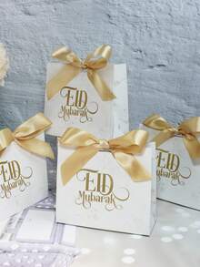 5pcs Elegant Eid Mubarak Marble-Style Gift Bags With Gold Foil Lettering And Satin Ribbon Bow, Premium Ramadan And Eid Favor Bags For Dates, Candy, Chocolate, Small Gifts, Party Favors, Iftar Treats, Family Gatherings, Festival Gift Wrapping, Decorative Packaging For Muslim Celebrations, Sturdy Boutique-Style Paper Bags Perfect For Festive Table Setups And Special Occasion Gifting - 11.5X4.5X10cm - View 3