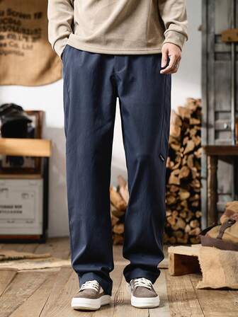 Pantalones casuales de talla grande para hombres, pantalones cargo de pierna recta con cintura elástica, bolsillos en diagonal y cremallera, de corte holgado