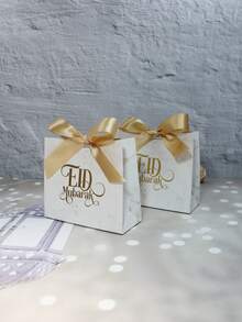 5pcs Elegant Eid Mubarak Marble-Style Gift Bags With Gold Foil Lettering And Satin Ribbon Bow, Premium Ramadan And Eid Favor Bags For Dates, Candy, Chocolate, Small Gifts, Party Favors, Iftar Treats, Family Gatherings, Festival Gift Wrapping, Decorative Packaging For Muslim Celebrations, Sturdy Boutique-Style Paper Bags Perfect For Festive Table Setups And Special Occasion Gifting - 11.5X4.5X10cm - View 5