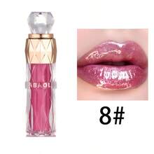 Una barra de labios brillante que proporciona un brillo hidratante, color duradero y cobertura total para todos los tonos de piel. Disponible en tonos baya y combinados, apta para todo tipo de piel, ofrece hidratación y un efecto voluminizador. Perfecta para viajes, trabajo y vacaciones. ¡Un éxito total! - Multicolor - Ver 16
