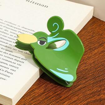 pocket monsters Detta gröna hårspänne från Pokémon-serien är ett bedårande och originellt hårtillbehör. Tillverkat av akryl är det ett praktiskt och vardagligt hårspänne som används för att hålla håret på plats. Kloklämmor Vinterhår Klo