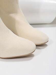بوت كاحل مصنوعة من الأقمشة المحبوكة ذات لون واحد وأصابع مستديرة، بوت ذات كعب سميك عصرية للتنقل، بوت محبوكة مرنة للخريف والشتاء، بوت سهلة الارتداء للعطلات - بيج - مشاهدة 8