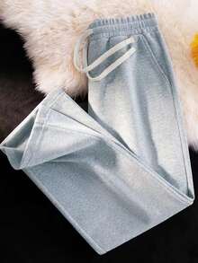 男士宽松休闲纯色阔腿裤，带抽绳腰带和大口袋，适合日常行走、工作、旅行和其他场合。