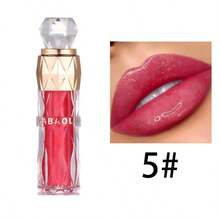 Una barra de labios brillante que proporciona un brillo hidratante, color duradero y cobertura total para todos los tonos de piel. Disponible en tonos baya y combinados, apta para todo tipo de piel, ofrece hidratación y un efecto voluminizador. Perfecta para viajes, trabajo y vacaciones. ¡Un éxito total! - Multicolor - Ver 8