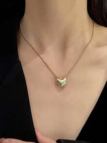 1件优雅金色心形吊坠项链，适合女孩参加派对佩戴，或作为母亲节礼物、情人节约会饰品。 - 均碼 - 查看 2
