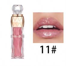 Una barra de labios brillante que proporciona un brillo hidratante, color duradero y cobertura total para todos los tonos de piel. Disponible en tonos baya y combinados, apta para todo tipo de piel, ofrece hidratación y un efecto voluminizador. Perfecta para viajes, trabajo y vacaciones. ¡Un éxito total! - Multicolor - Ver 9