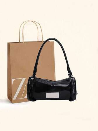 时尚新款纯色复古油皮高端小众设计波士顿枕形腋下单肩包，百搭欧美风格，适合通勤、购物、街头风、时尚穿搭，也是送给女朋友的礼物。