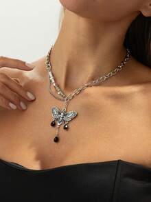 1 pieza Collar de cadena cruzada con cabeza de calavera de cristal bohemio con borla, joyería elegante y versátil como regalo para uso diario, festivales y fiestas