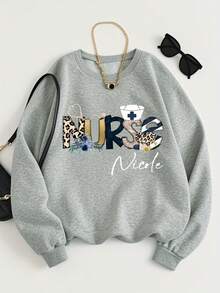 1Pc Women'S -Blended Nurse Nicole Graphic Sweatshirt - Leopard Print & Floral Stethoscope Design, Long Sleeve Round Neck Pullover For Nursing Professionals, Spring/Fall Casual Workwear, Comfortable & Stylish Apparel For Hospital Staff, Scrubs Alternative, Healthcare Clothing, Durable Material, Soft Fabric, Printed Sweater, Workwear Top, Healthcare Workers, Professional Women, Nurse Scrub Top, Crew Neck Sweatshirt For Women, Fall Sweatshirt For Women, Winter Clothe For Women, Fall Clothe Women's Minimalist Regular Fit Long Sleeve Sweatshirt - Casual Daily Outfits Top - 淺灰色 - 查看 1