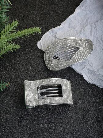 1个优雅简约银色水钻镂空椭圆方形发爪夹，防滑齿设计，可固定发髻，适合日常外出和休闲聚会