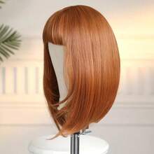 Parrucca dritta arancione da 16 pollici con frangia per donna - Capelli sintetici resistenti al calore, adatta ai principianti, perfetta per uso quotidiano e feste