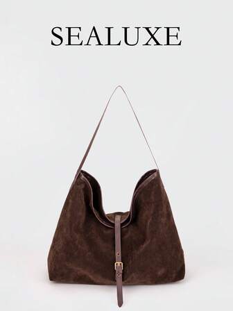 这款时尚复古风大容量女士单肩包采用新月形设计，由咖啡棕色绒面革材质制成。搭扣设计营造出轻松简约的美感，是日常通勤、购物出行及其他外出活动的理想之选。