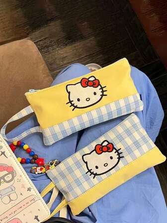 Sanrio Adorable Hello Kitty Checkered Pencil Case (Key Ring Not Included). A Unique And Stylish Handheld Stationery Bag, Perfect For Students As A Pencil Case, Organizer, Or Decoration. It Also Makes A Wonderful Back-To-School Gift.