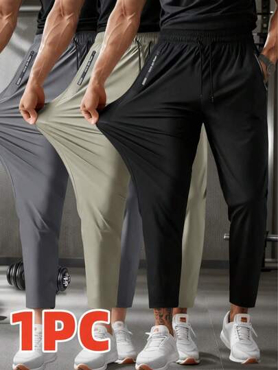男士轻便透气七分运动裤，高弹面料，抽绳腰带，拉链口袋，适合健身、慢跑、休闲穿着