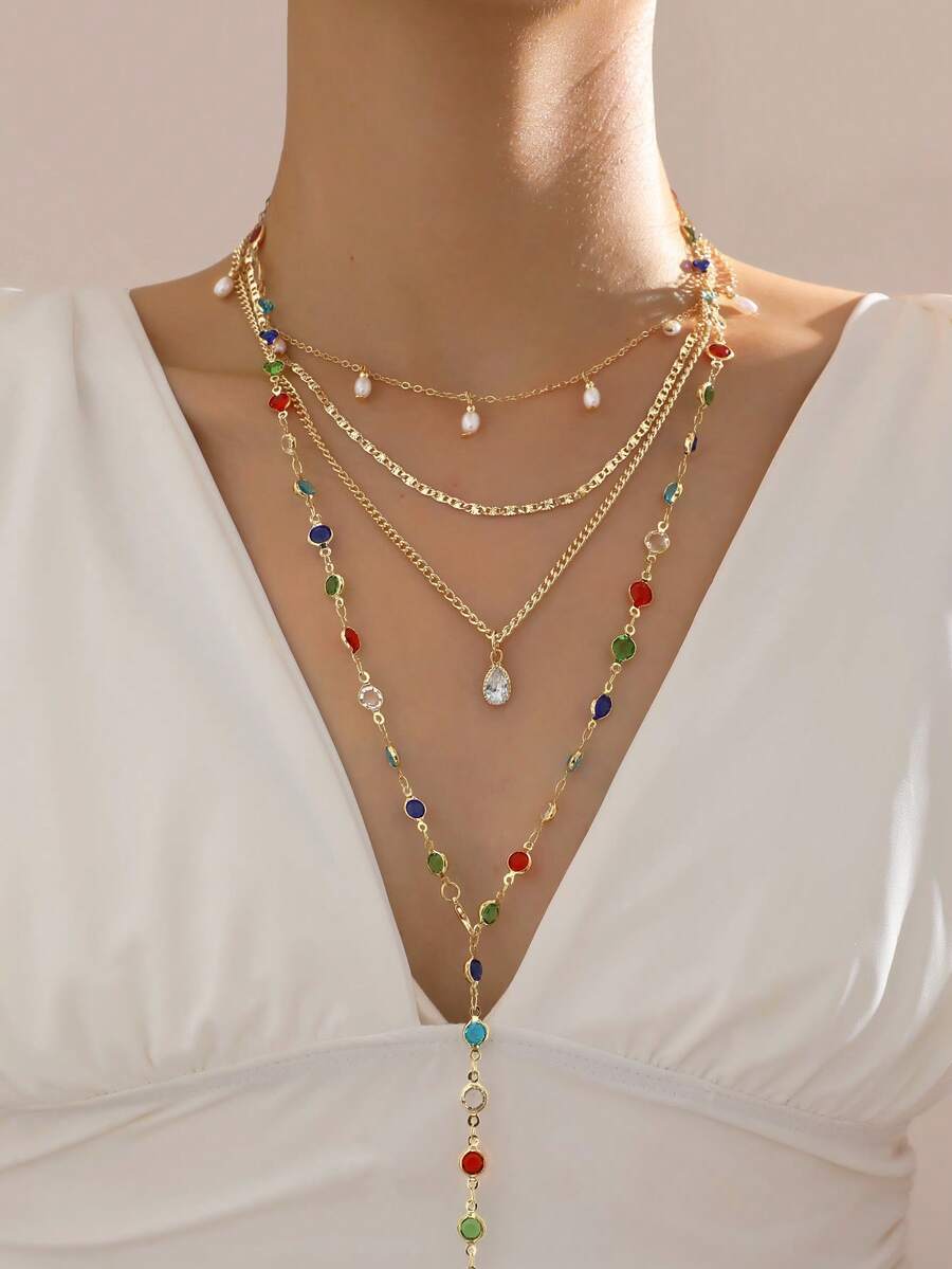 4 قطع طقم قلادة للنساء، قلادة طويلة متعددة الطبقات على شكل حرف Y، تصميم أنيق وفريد من نوعه، طراز مبالغ فيه أنيق، مرصعة بأحجار كريمة اصطناعية لامعة، سلسلة ذهبية، قلادة قطرة لؤلؤ اصطناعي، مناسبة للاستخدام اليومي والحفلات والهدايا