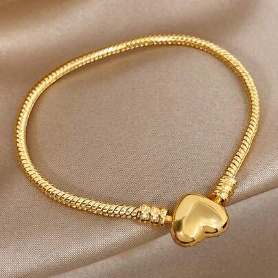 Pulseira feminina de luxo com corrente de cobra e pingente de coração banhada a ouro 18K, resistente ao desbotamento. Joia romântica perfeita para presentear mães em ocasiões como Natal, Dia de Ação de Graças, Carnaval, Halloween, casamentos, festas, raves, formaturas e eventos do dia a dia. Ideal para aniversários, Dia dos Namorados, aniversários e para presentear madrinhas.