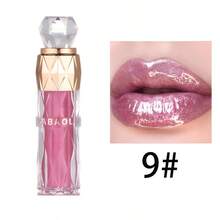 Una barra de labios brillante que proporciona un brillo hidratante, color duradero y cobertura total para todos los tonos de piel. Disponible en tonos baya y combinados, apta para todo tipo de piel, ofrece hidratación y un efecto voluminizador. Perfecta para viajes, trabajo y vacaciones. ¡Un éxito total! - Multicolor - Ver 15